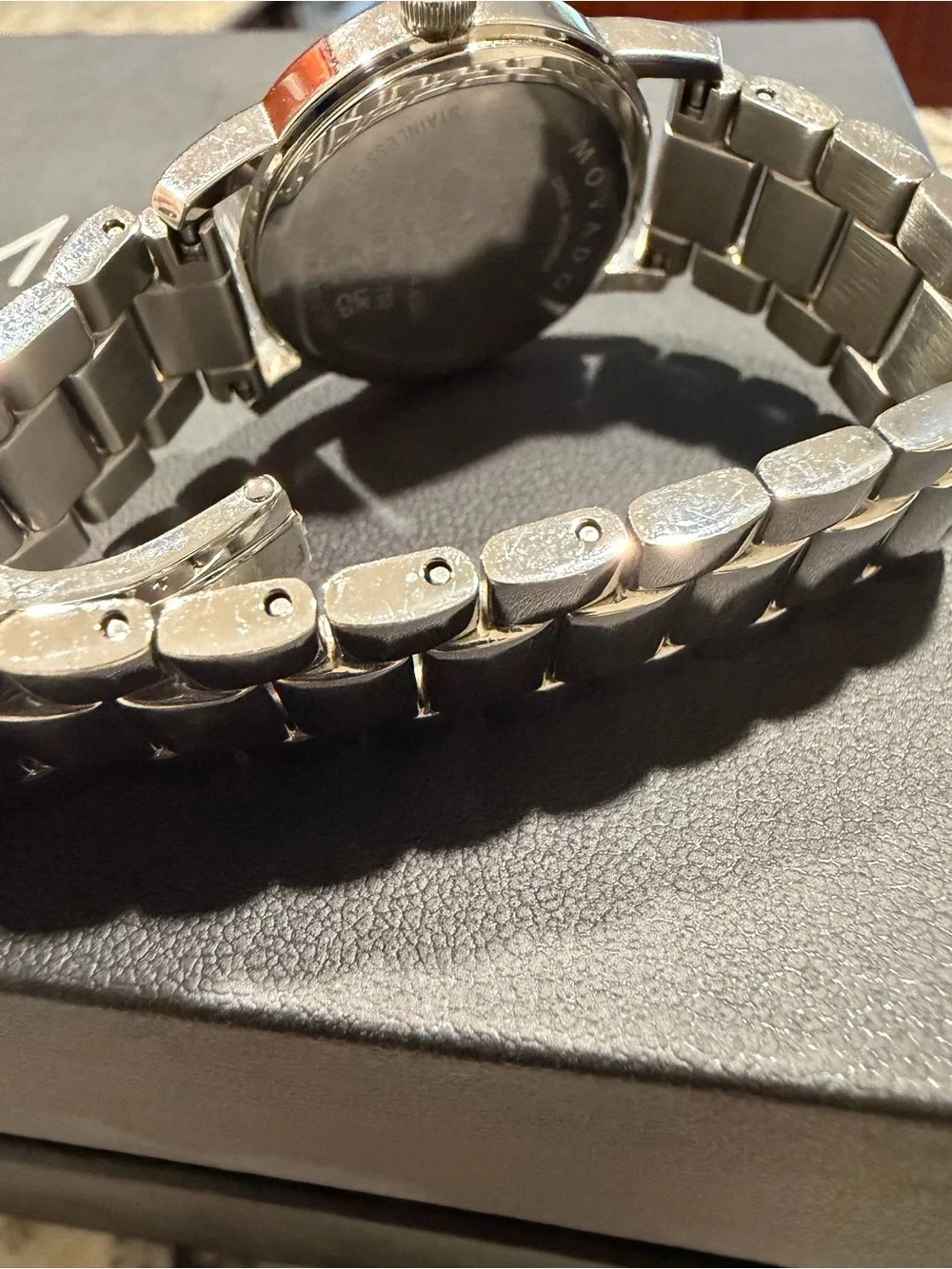 Movado Silver Bracelet Watch with Black Dial